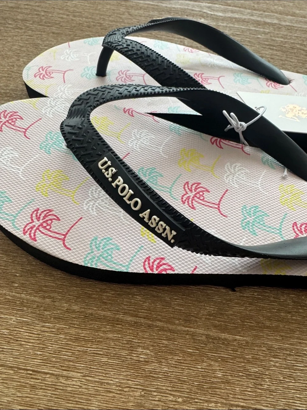 U.S. Polo Assn. Kids Pink Palm-Print Flip Flops with Black Straps